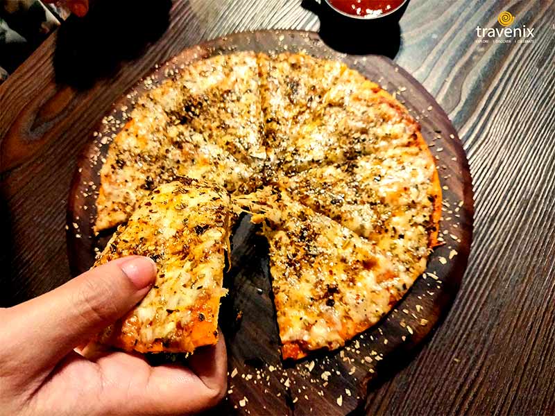 thin crust Bombay Masala Pizza