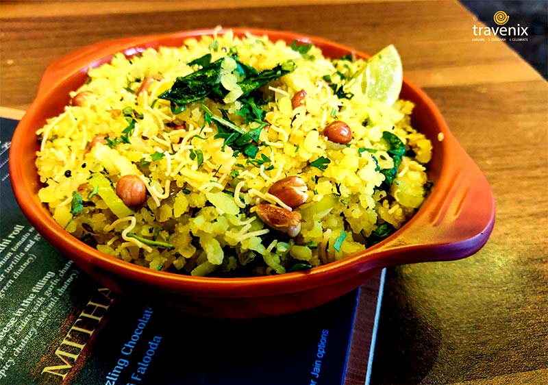 soft Poha loaded with crispy peanuts