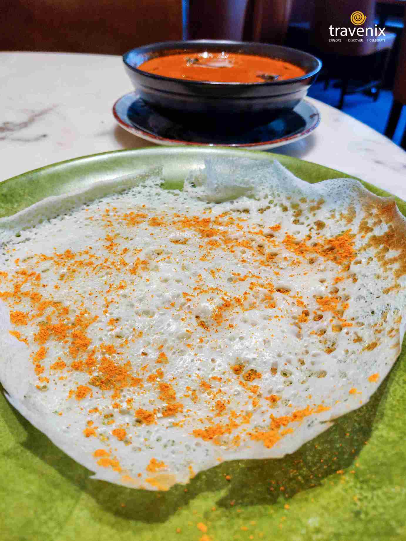 Appam with chicken gassi