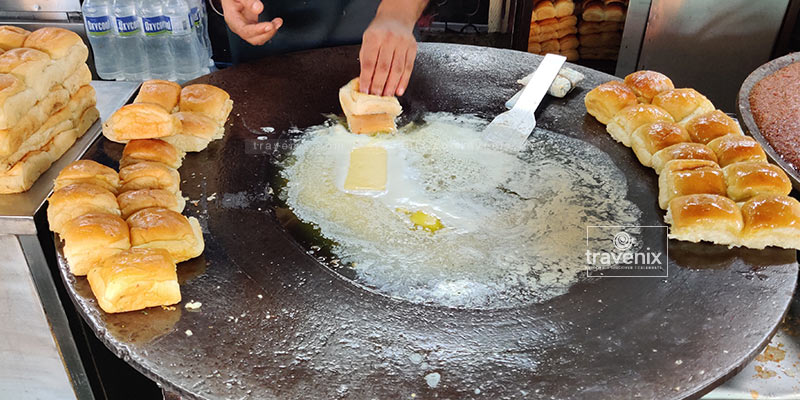 Pav being heated in butter at Cannon Pav Bhaji